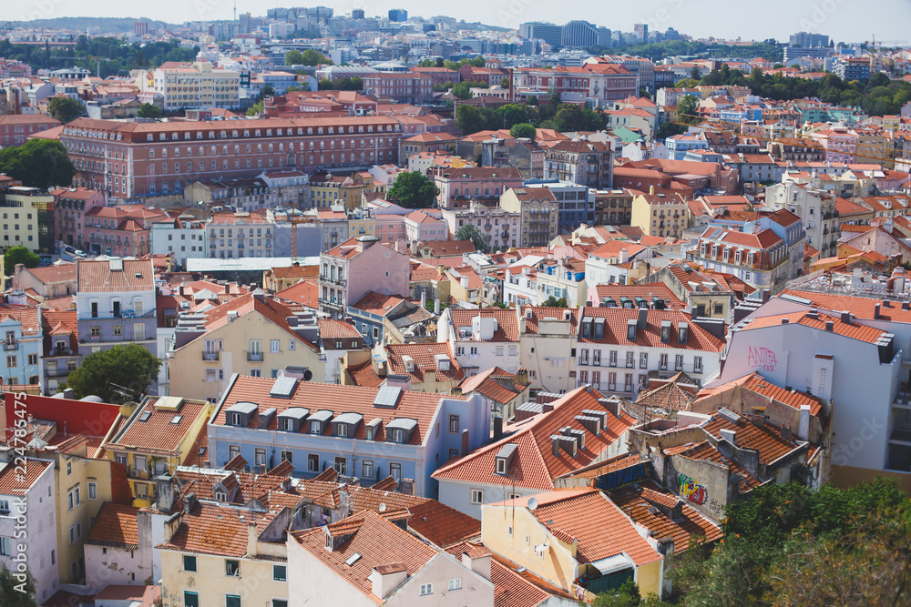Beautiful super wide-angle aerial view of Lisbon, Portugal with harbor and skyline scenery beyond the city, shot from  belvedere observation deck