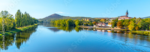 Radobyl Mountain in Ceske Stredohori, Central Bohemian Uplands. View from Labe River in Litomerice, Czech Republic. photo