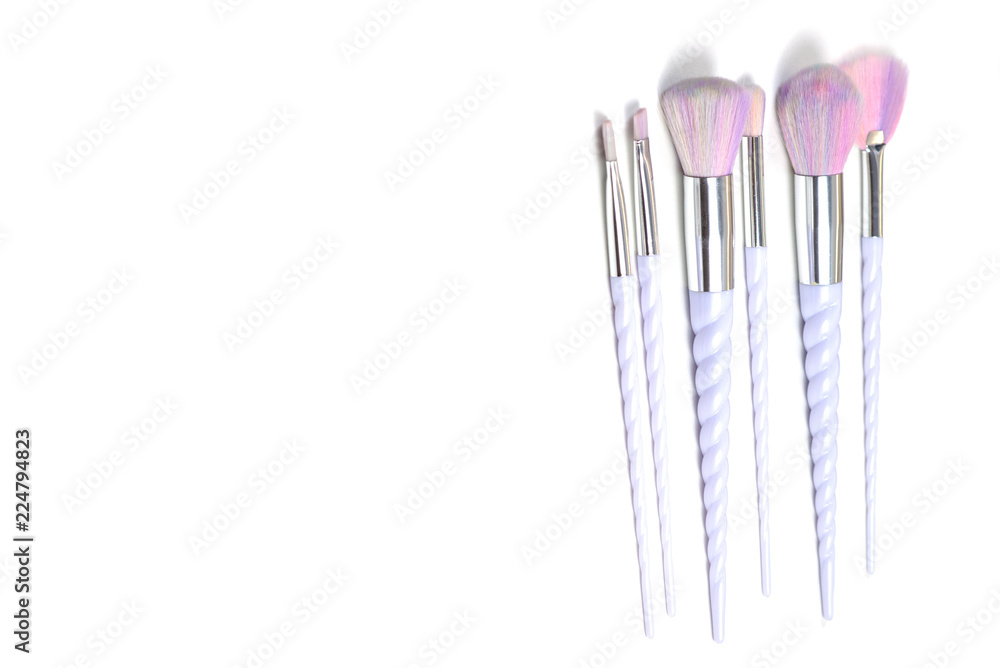 isolated unicorn colour makeup brushes kit on white background. copy space for commercial isolated unicorn colour makeup brushes kit on white background. copy space for commercial