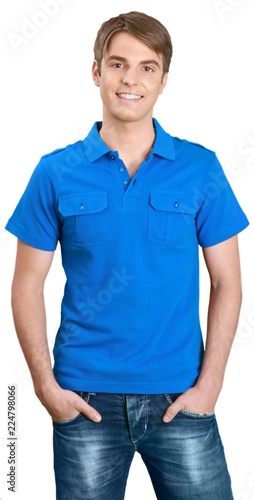 Young handsome man in blue shirt isolated on white background