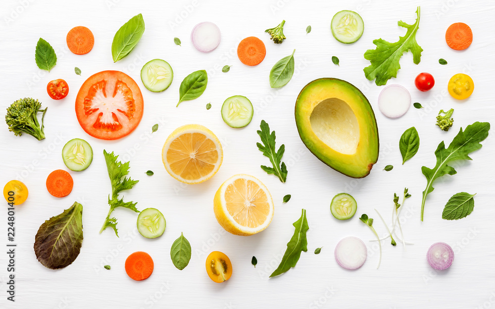 Food pattern with raw ingredients of salad on white wooden background. Food pattern with raw ingredients of salad on white wooden background.