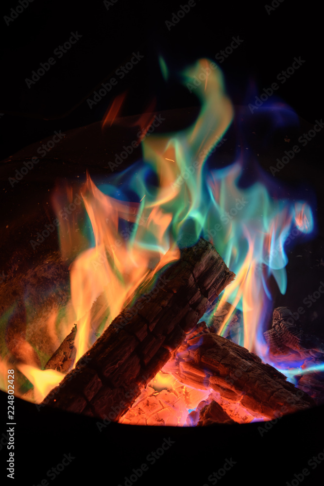 Fototapeta premium colourful campfire while camping