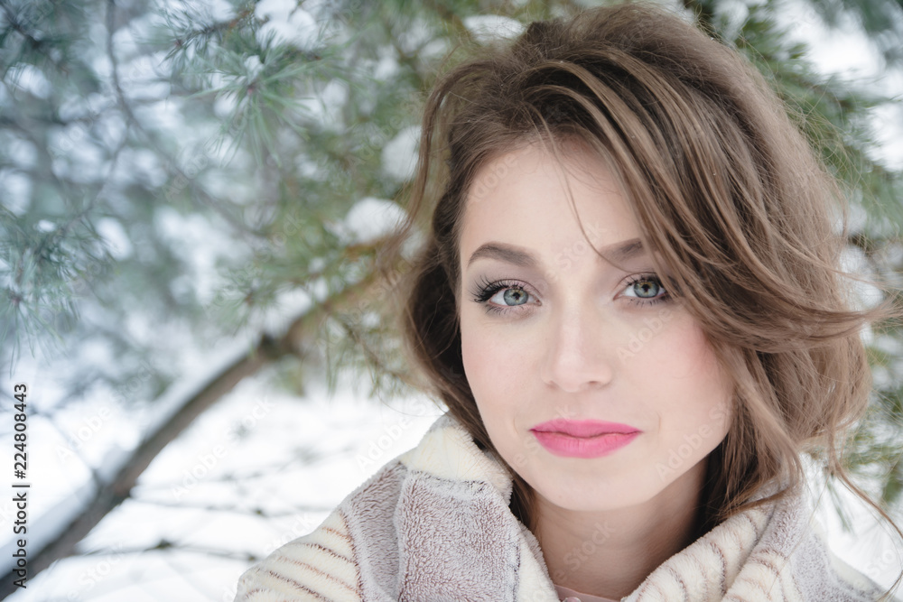 Portrait of an attractive brunette in the forest Portrait of an attractive brunette in the forest