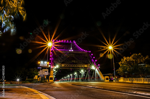 City road with bridge construction in night