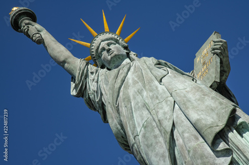 statue of Liberty  in Paris on the ile aux Cygnes, an island in the Seine, Paris, France photo
