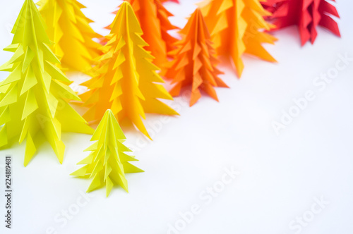 Multicolored paper Christmas tree white background