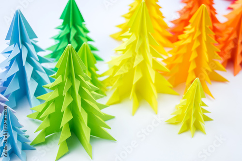 Multicolored paper Christmas tree white background