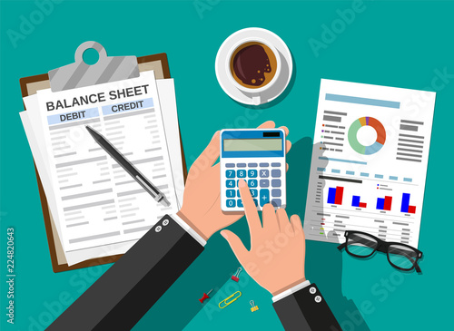 Accountant checks money balance