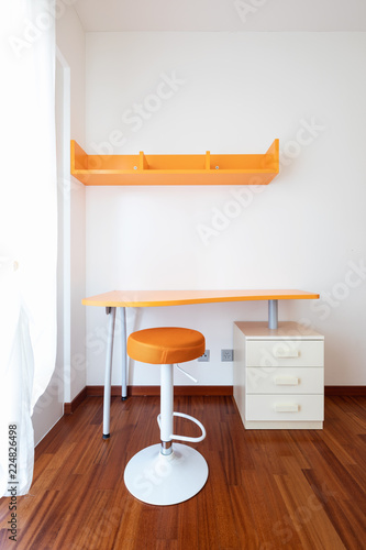 Orange desk and stool detail © alexandre zveiger