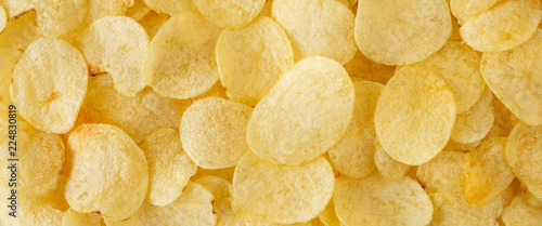 Fotografie, Obraz crispy potato chips snack texture background top view
