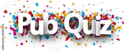 Pub quiz sign with colorful confetti.