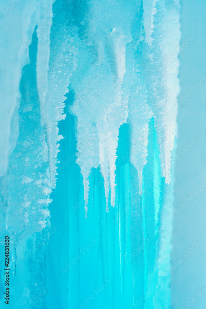 Hanging Icicles against blue sky. Hanging Icicles against blue sky.