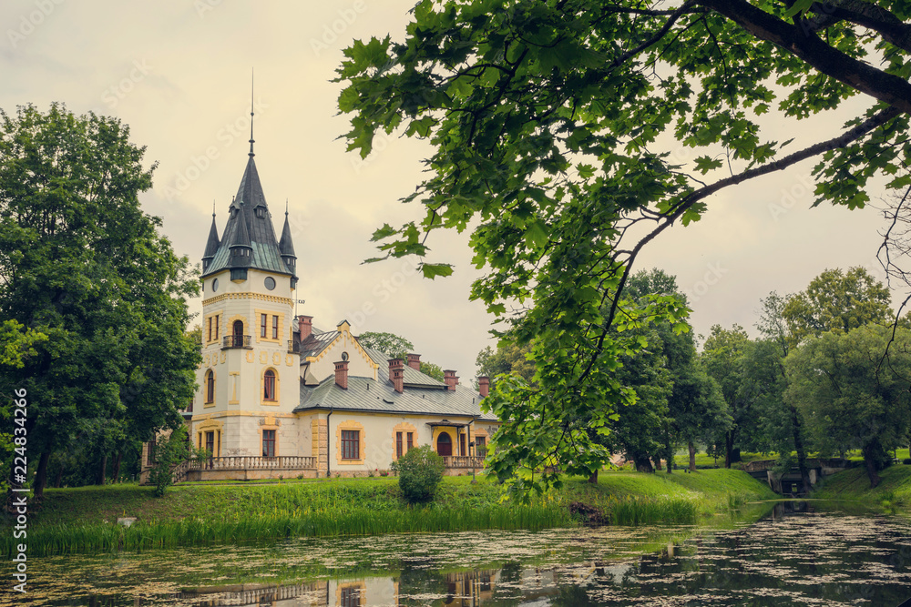 Palace in Olszanica among the trees, Bieszczady, Poland Palace in Olszanica among the trees, Bieszczady, Poland