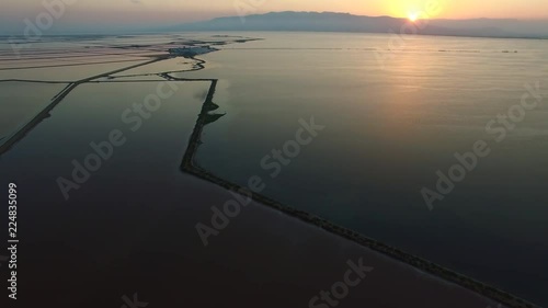 Sunset reflection in the rice fields of Ebro Delta estuary Europe, Spain, Catalonia, Province of Tarragona, Terres de l'Ebre, Deltebre, Punto de la Banya 