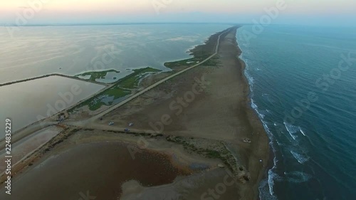 Long tongue of sand, Sandbank of Ebro Delta estuary during golden sunset. Europe, Spain, Catalonia, Province of Tarragona, Terres de l'Ebre, Deltebre, Punto de la Banya 