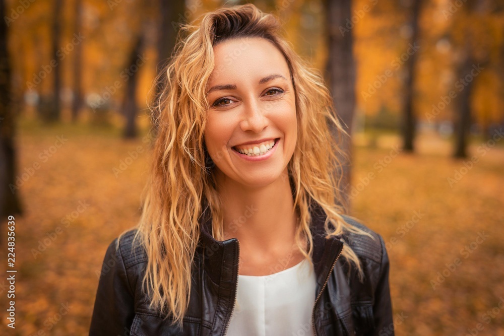 Portrait of a girl in the autumn park. Portrait of a girl in the autumn park.