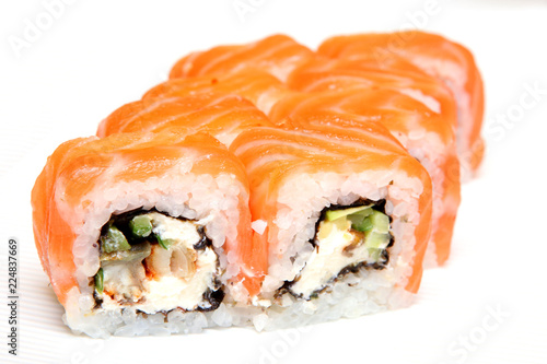 Roll Tokyo. Sushi with salmon, eel, tender cheese. Japanese food on a beautiful dish.