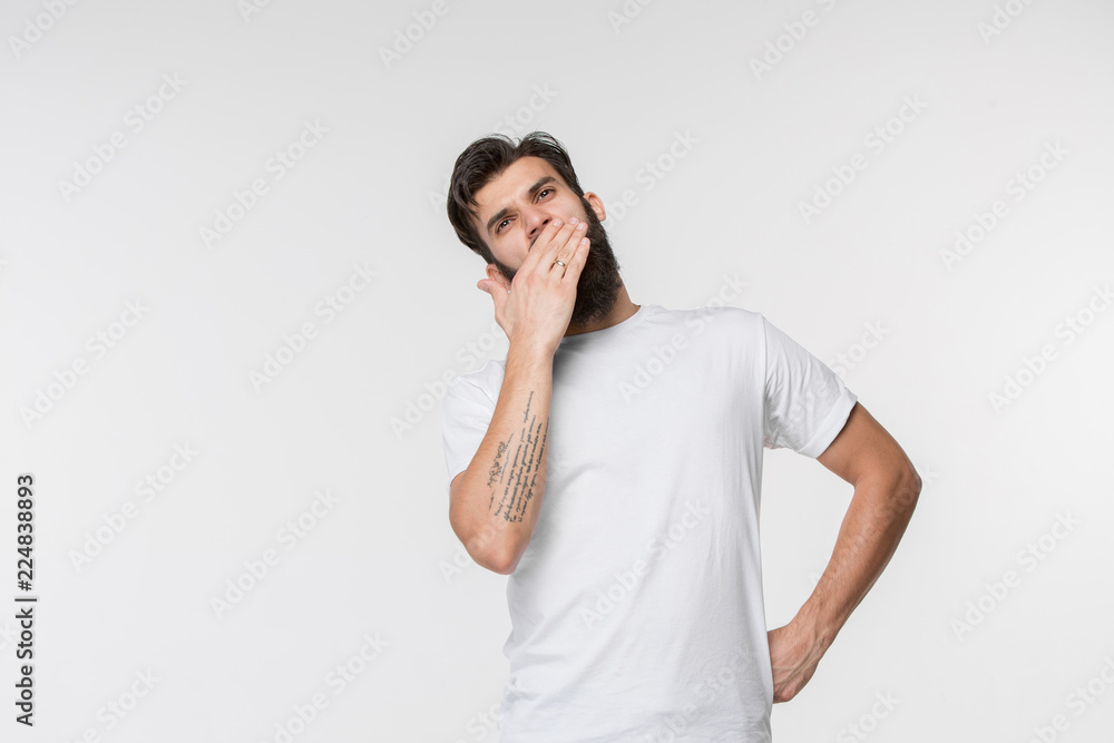I am tired of everything. Bored man. Boring, dull, tedious concept. Young caucasian emotional man. Human emotions, facial expression concept. Studio Isolated on white background I am tired of everything. Bored man. Boring, dull, tedious concept. Young caucasian emotional man. Human emotions, facial expression concept. Studio Isolated on white background