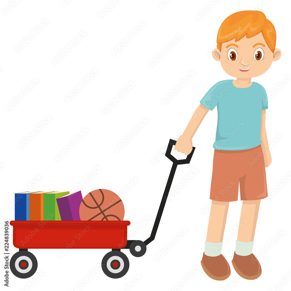 Young happy little boy playing with red wagon Young happy little boy playing with red wagon