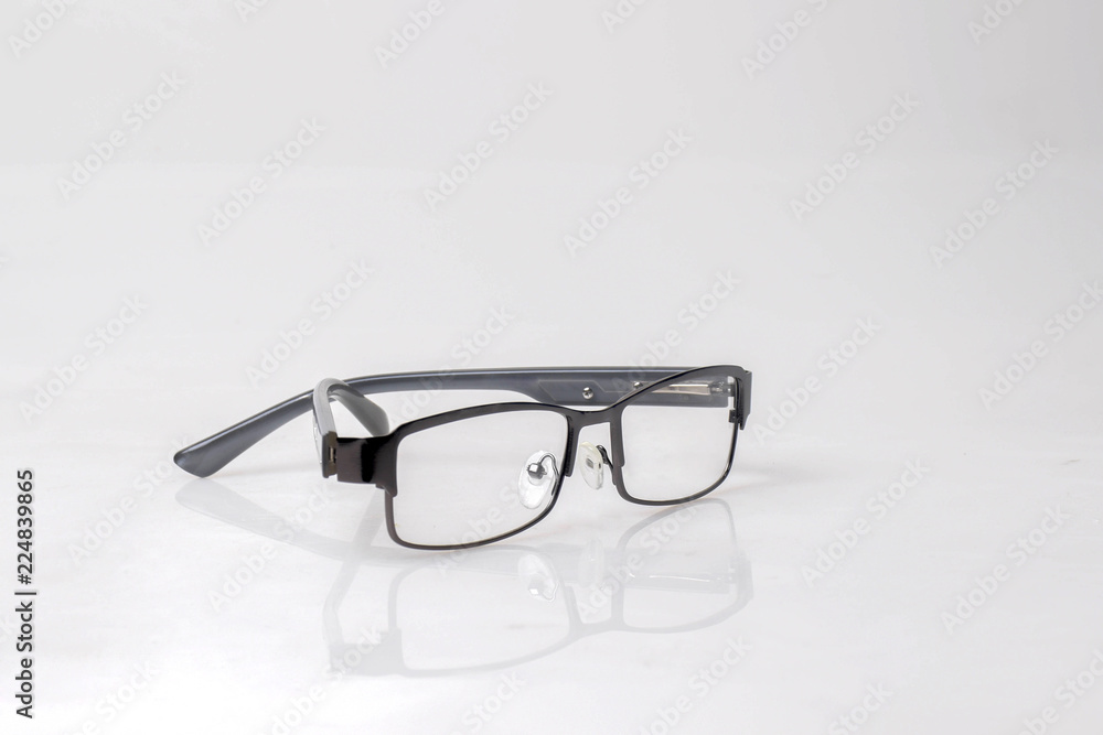 side black glasses on white background,copy space