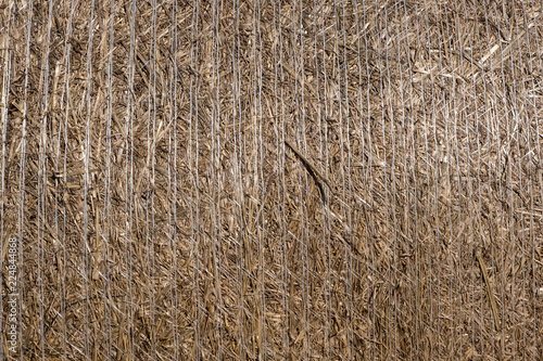 Close-up of straw bale drying on a sunny day.