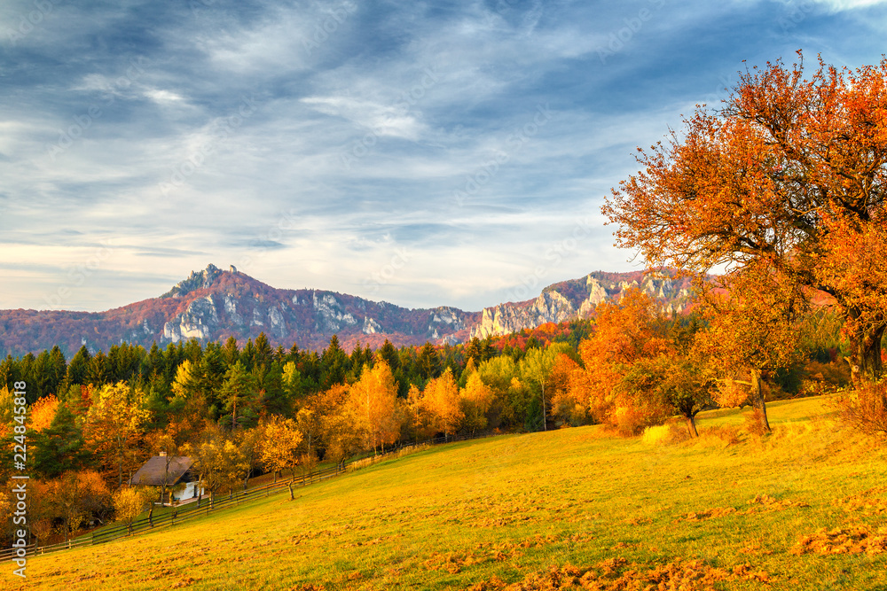 Naklejka premium Landscape with a trees in autumn colors. Mountains in the Sulov rocks Nature Reserves, Slovakia, Europe.