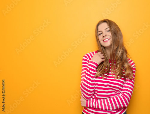 Beautiful young woman on co...