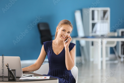 Young businesswoman working...