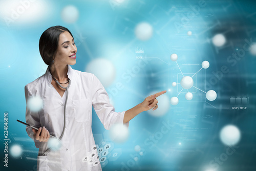Molecular Biology, Genetics and Medical Concept. A woman, scientist, doctor or biologist, is working in a futuristic, augmented reality virtual space, interacting or researching on molecular level