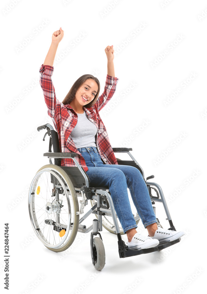 Happy young woman sitting in wheelchair on white background Happy young woman sitting in wheelchair on white background