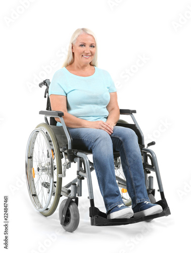 Mature woman sitting in whe...