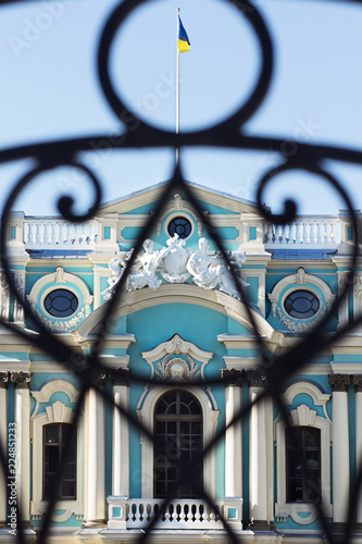 Fragment of facade of the Mariinsky Palace with the Ukrainian flag on roof  Kiev  Ukraine