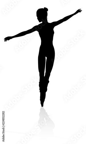 Silhouette of a ballet dancer dancing in a pose or position