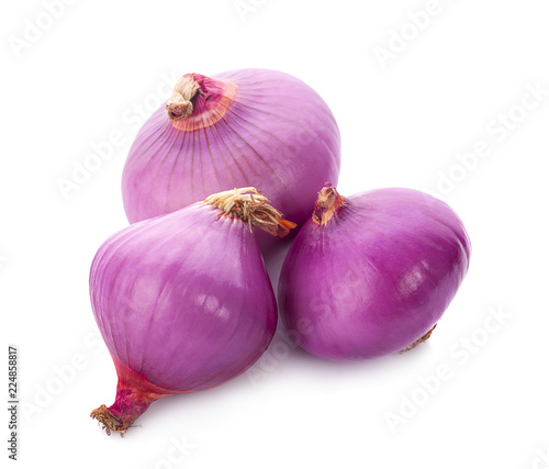 Slices of shallot onions for cooking on white background.