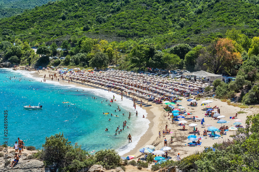 Naklejka premium Olympiada, Greece - August 11, 2018: Proti Ammoudia beach, one of the most beautiful beaches in the Aegean Sea.