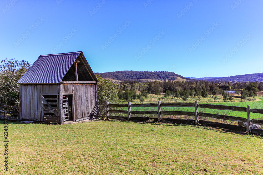 Timber Meat drying shed and rural landscape