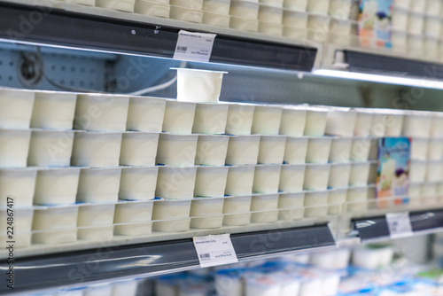 Yoghurts on the shelf in the supermarket