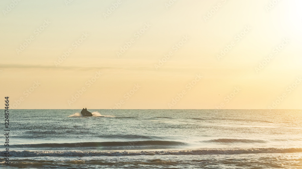 Fototapeta premium Fishermen on a boat in the open sea