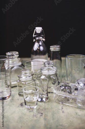 Glass bottle placed together as a group. There are a variety of forms.