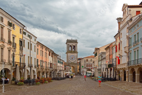 Este, Italy August 24, 2018: the clock tower on the main square in Este. photo