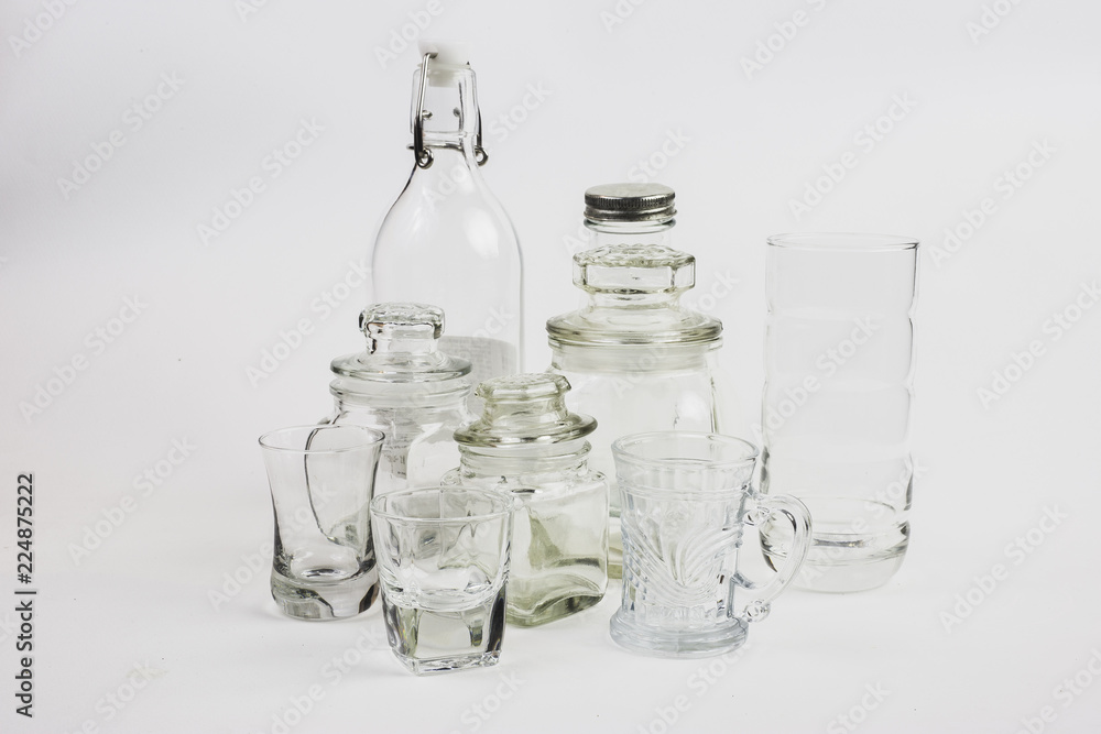 Glass bottle placed together as a group. There are a variety of forms.