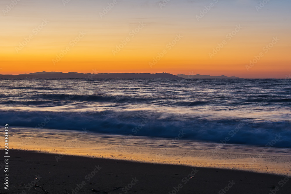 Early morning , dramatic sunrise over sea. Photographed in Asprovalta, Greece. Early morning , dramatic sunrise over sea. Photographed in Asprovalta, Greece.