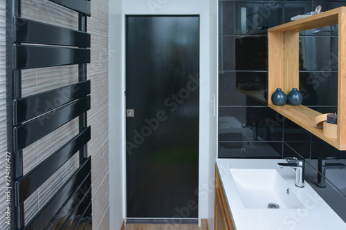 Black bathroom in a house. Black wood style