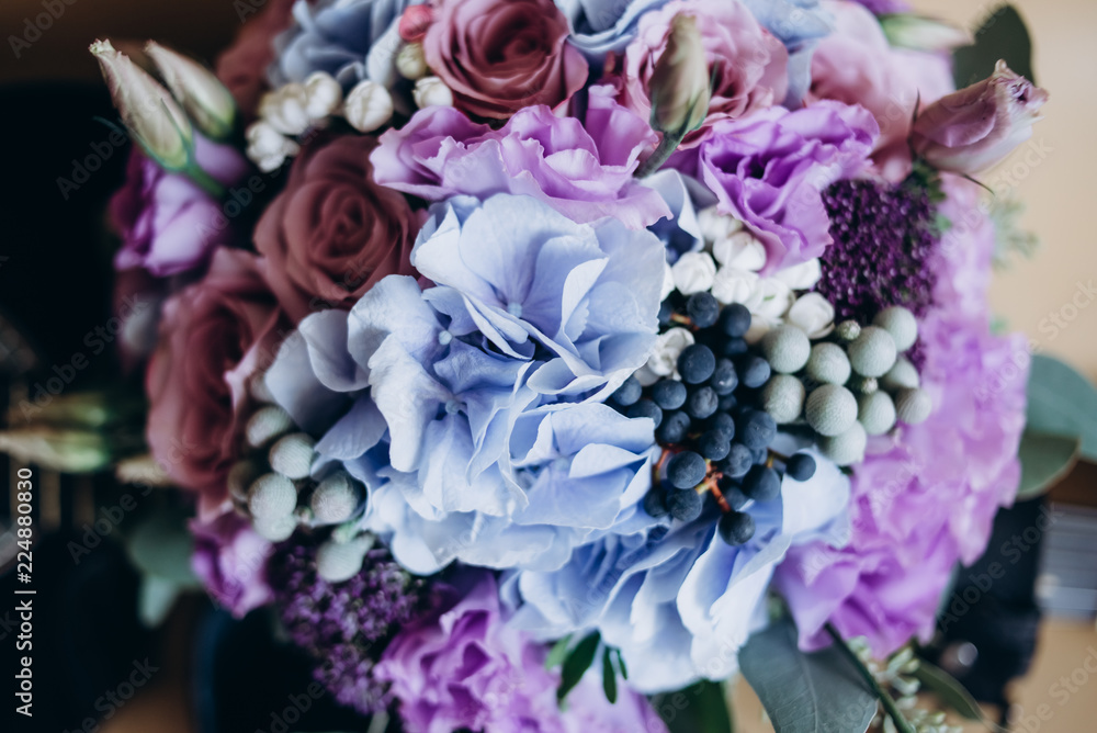 wedding bouquet of red and blue flowers