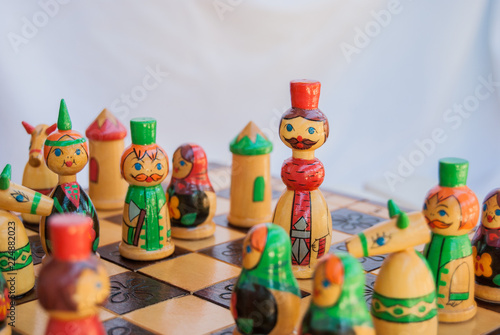 Close-up of king with pawns on the chessboard