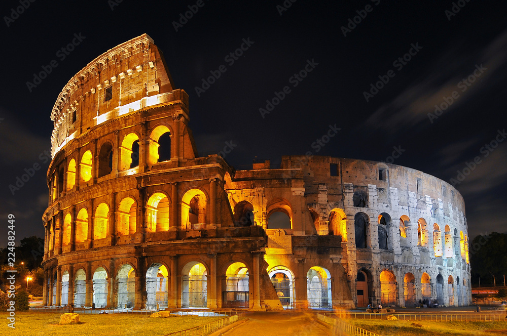 Twilight view of Colosseo in Rome, elliptical largest amphitheatre of Roman Empire ancient civilization, Rome, Italy.