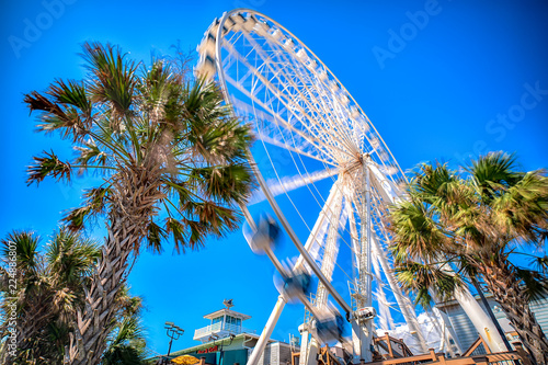 ferris wheel on blue sky photo