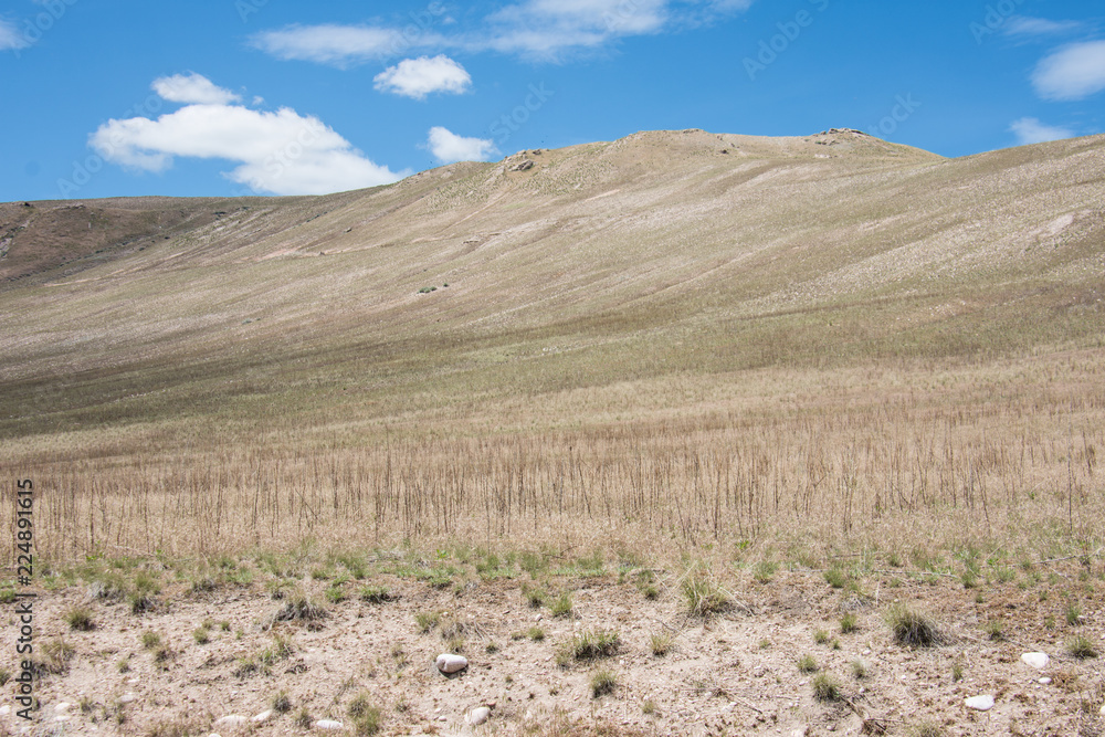 Barren foothills landscape in Antelope Island State Park, near Salt Lake City, UTAH, with lots of copyspace