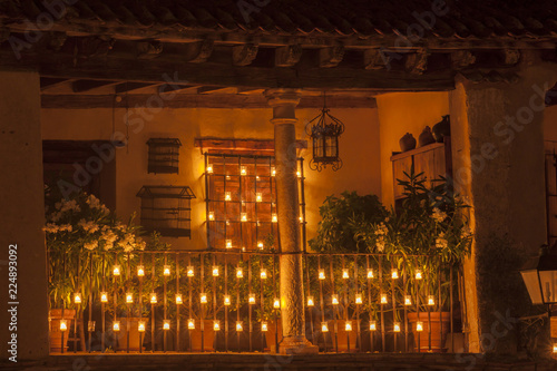 Balcony, iluminated only by candles. La noche de las velas de Pedraza, Segovia