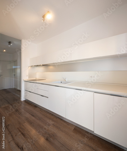 Obraz na plátne Modern white kitchen detail in apartment